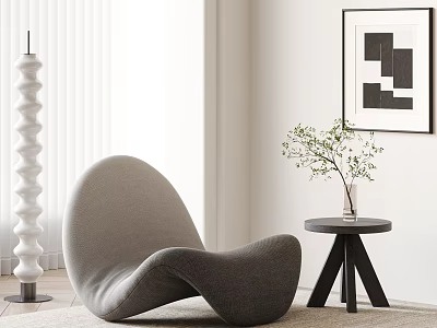 Gray Lounge Chair with Side Table Vase Green Plant and White Spiral Decorative Column 3d model