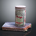 Vintage Tea Tin With Label Placed On Rustic Wooden Board Surface