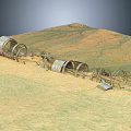 Sandy Terrain Featuring Metal Tunnels And Damaged Circular Structures