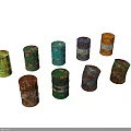 Collection Of Vintage Rusted Oil Drums In Various Colors And Styles