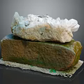 Natural Rock Formation With White Crystal Stone And Mossy Gravel Base