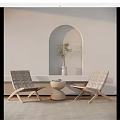 Woven Two Chairs And Small Round Table In Light Room With Arched Niche Green Plant