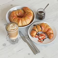 Fresh Croissants With Latte And Strawberries Drizzled In Chocolate Sauce