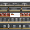 Various Road Railings With Orange Barriers And Red White Traffic Dividers On Street