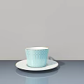 Light Blue Geometric Pattern Cup On White Saucer Over Smooth Gray Dining Table 3d model