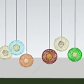 Colorful Spherical Pendant Lights with Woven Design Illuminating Green Grass Area