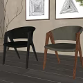 Gray and Black Leather Leisure Chairs with Wooden Legs in Modern Interior with Wall Art