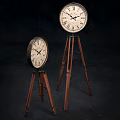 Two Vintage Clocks on Wooden Tripod Stands with Roman Numeral Dials