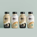 Elegant Bottled Coffee Beverage With Minimalist Label Design And Four Bottles