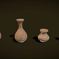 Handcrafted Ceramic Vessels Arranged in Various Sizes Shapes and Earthy Brown Tones on Dark Background