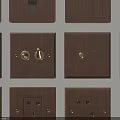 Metallic Bronze Switch Panels with Various Switches Sockets Neatly Arranged on Wall