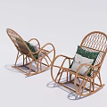 Wicker Rocking Chairs With Green And White Cushions For Comfortable Relaxation