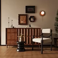 Cozy Accent Chair With Walnut Cabinet Decorative Wall Art And Potted Plant On Wooden Floor
