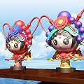 Cartoon Style Sculptures With Red Purple Opera Headdresses On Wooden Table