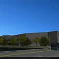 Aerial Planning of Modern Large Public Building With River Greenery Roads and Parking Area