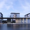Modern Entrance Gate Architectural Design With Water Surface Surrounding Buildings And Evening Lighting