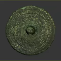 Ancient Bronze Mirror With Circular Shape Intricate Carvings Text Inscriptions And Green Patina
