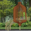 Park Landscape Featuring Orange Lantern Shaped Metal Pavilion With Trees Greenery And Wooden Stairs