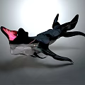 Winged Mythical Creature Sculpture With Black Body Red Accents And Transparent Details