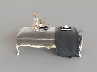 Elegant Gray Ottoman With Gold Legs Round Tray Dark Blanket And Decorative Items 3d model
