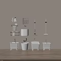 Bathroom Essentials With White Toilet Sink Black Metal Towel Racks And Cleaning Tools