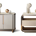 Modern Beige Bedside Tables With Gold Accents Cabinet Doors And Decorative Sculptures