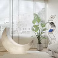 Moon Shaped Decorative Lamp in Bright Living Room with Green Plant Window Blinds and Sofa