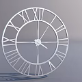 Silver Circular Clock With Roman Numeral Markers And Minimalist Metal Frame Design