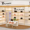 PLOVER Bag Store Interior With Shelves Displaying Various Handbags And Decorative Plants