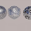 Floral Display Decoration Featuring Three Metallic Hollow Spheres With Intricate Designs