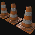 Three Worn Traffic Cones With Orange And White Stripes On Black Background