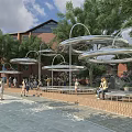 Modern Urban Public Leisure Landscape With Unique Circular Metal Shades Comfortable Seats And Lush Greenery