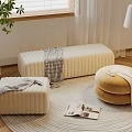 Beige Velvet Ottomans of Various Shapes in Living Room with Blanket Magazine Plant and Window