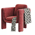 Cozy Red Fabric Accent Chair With Black And White Geometric Pattern Blanket