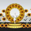 Floral Installation With Circular Sunflower Arrangement Platform And Woman In Pink Dress On Black Background