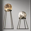 Modern Spherical Floor Lamps With Moon Textured Shades And Metal Tripod Bases