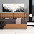 Double Bed With Brown Tufted Headboard Nightstands Lamps Wall Art And Potted Plant In Background