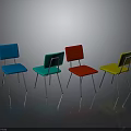 Colorful Blue Green Red And Yellow Chairs With Metal Legs And Floor Reflections