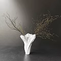White Textured Vase With Golden Dotted Branches On Dark Background And Soft Lighting