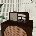 Vintage Radio On Wooden Cabinet With Lattice Wall And Green Plant