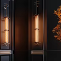 Modern Symmetric Wall Lamps With Metal Frame Glass Shades And Warm Glow On Dark Wall