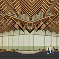 Modern Hotel Building With Triangular Wooden Roof And Glass Facade Surrounded By Trees