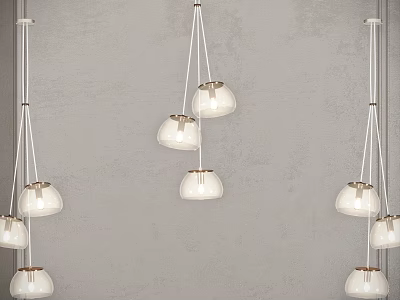 Modern Pendant Lights With Glass Shades And Gold Trim Hanging On Gray Wall Background 3d model