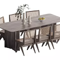 Wooden Dining Table Set with Woven Back Chairs Flower Vase and Fruit Bowl