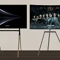 Modern Televisions on Stands One Black Screen with White Curve and One Displaying Movie Characters