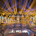 Modern Stage Setup With Illuminated Lighting Steps Backdrop Displays And Front Table