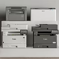 Office Appliances Display Various Canon Printers in Different Colors on White Shelf
