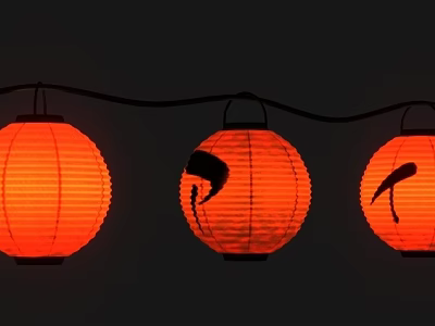 Decorative Orange Festive Lanterns Strung Together with Black Design on Middle One 3d model