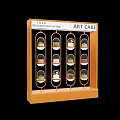 Art Cake Window Display Featuring Various Cakes in Glass Cases with House of Art Logo