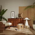 Warm Modern Wooden Dresser With Framed Art Green Plants And Cozy Sofa In Sunlight